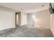 Bright bedroom featuring double closets and wall-to-wall carpet at 1475 S Quebec Way # H38, Denver, CO 80231