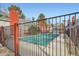 Community swimming pool with metal fence at 1475 S Quebec Way # H38, Denver, CO 80231