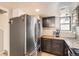 Modern kitchen with stainless steel appliances and granite countertops at 1475 S Quebec Way # H38, Denver, CO 80231