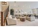 Basement living room featuring stairs, a large sofa, and modern decor at 3341 N Buchanan Way, Aurora, CO 80019