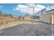 The backyard has a wooden fence, and the home is located on the property at 19003 E Oxford Dr, Aurora, CO 80013