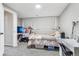 Bedroom features an area for a bed, an area for a desk, and neutral walls perfect for customization at 19003 E Oxford Dr, Aurora, CO 80013