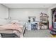 Bedroom features an area for a bed, an area for a desk, and neutral walls perfect for customization at 19003 E Oxford Dr, Aurora, CO 80013