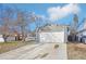 A charming single-Gathering home featuring an attached two-car garage and front yard at 19003 E Oxford Dr, Aurora, CO 80013