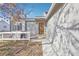 A cozy single-Gathering home featuring a wood front door and welcoming entrance at 19003 E Oxford Dr, Aurora, CO 80013
