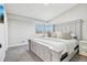 Spacious main bedroom featuring soft carpet, abundant natural light, and a peaceful ambiance at 19003 E Oxford Dr, Aurora, CO 80013