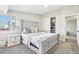 Inviting main bedroom with plush carpet, neutral décor, closet, and an abundance of natural light at 19003 E Oxford Dr, Aurora, CO 80013
