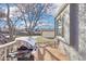 A backyard patio boasts a stainless steel grill, perfect for outdoor cooking and entertaining at 19003 E Oxford Dr, Aurora, CO 80013