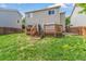 Well-maintained backyard with a wooden deck perfect for outdoor gatherings and relaxation at 19463 E Hollow Creek Dr, Parker, CO 80134