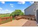 Spacious deck with a long built-in bench, ideal for entertaining and enjoying the outdoor scenery at 19463 E Hollow Creek Dr, Parker, CO 80134