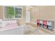 Bright entryway with large window and practical storage solutions for shoes and coats at 19463 E Hollow Creek Dr, Parker, CO 80134
