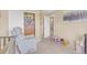 A playroom featuring toys and a comfortable chair with neutral walls and carpeted floors at 19463 E Hollow Creek Dr, Parker, CO 80134