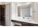 Bathroom with marble vanity and view into the shower/tub area at 4653 Kirkwood St, Boulder, CO 80301