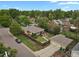 Aerial view of a lovely home showcasing its expansive backyard, garage, and driveway at 1600 Olive St, Denver, CO 80220
