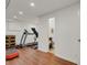 Basement area with workout area and view to bathroom at 1600 Olive St, Denver, CO 80220