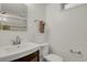 Clean bathroom with updated vanity and fixtures at 1600 Olive St, Denver, CO 80220