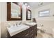 Bathroom boasts double sinks, modern fixtures, dark wood vanities, and a clean design at 1600 Olive St, Denver, CO 80220