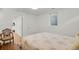 Cozy bedroom with rug and lots of natural light at 1600 Olive St, Denver, CO 80220