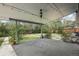 Covered back patio with string lights overlooking the spacious backyard at 3179 S University Blvd, Englewood, CO 80113