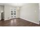Dining room with hardwood floors and glass patio doors at 3179 S University Blvd, Englewood, CO 80113