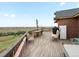 Spacious deck featuring outdoor seating and scenic views of the surrounding landscape at 16535 W 79Th Dr, Arvada, CO 80007