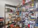 Walk-in pantry with wire shelving and ample storage at 16535 W 79Th Dr, Arvada, CO 80007