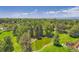 Beautiful aerial view of a green lush park and lake on a sunny day at 1900 E Girard Pl # 908, Englewood, CO 80113