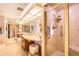 Well-lit bathroom featuring a large mirror, granite countertop, and glass enclosed shower at 1900 E Girard Pl # 908, Englewood, CO 80113
