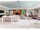 Large community room with a fireplace, dining area, and comfortable seating, perfect for gatherings and events at 1900 E Girard Pl # 908, Englewood, CO 80113