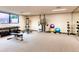 Bright gym featuring weights, fitness machines, workout balls and a mirrored wall at 1900 E Girard Pl # 908, Englewood, CO 80113
