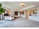 Bright living area with comfortable seating, fireplace, and open layout at 1900 E Girard Pl # 908, Englewood, CO 80113