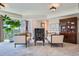 Cozy living room with elegant furniture, fireplace, and scenic views at 1900 E Girard Pl # 908, Englewood, CO 80113