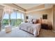 Inviting main bedroom with a large window view and decorative wall art at 1900 E Girard Pl # 908, Englewood, CO 80113