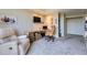 Bright home office with a built-in desk, natural light, and comfortable seating perfect for remote work or study at 1900 E Girard Pl # 908, Englewood, CO 80113