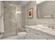 Bathroom features a marble-tiled shower with glass door and vanity at 3476 Beeler Ct, Denver, CO 80238