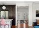 Open concept view through the modern kitchen, showcasing a glimpse of the bright foyer at 3476 Beeler Ct, Denver, CO 80238