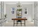 Clean home office features a modern desk, ample natural light, and minimalist decor at 3476 Beeler Ct, Denver, CO 80238