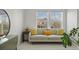 Cozy living room featuring a neutral sofa, a large window, and natural light at 3476 Beeler Ct, Denver, CO 80238