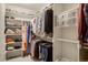 Spacious walk-in closet with ample shelving and storage for clothes and accessories at 3476 Beeler Ct, Denver, CO 80238