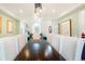 Bright dining area with seating for ten and views into the living room of this open concept home at 469 Tripp Dr, Golden, CO 80401