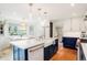 Spacious kitchen featuring an island, modern appliances, and stylish finishes at 469 Tripp Dr, Golden, CO 80401