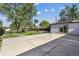 Large backyard with sport court, patio area, and outbuilding at 8641 Lowell Blvd, Westminster, CO 80031