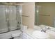 Modern bathroom features tiled shower, stylish vanity, and updated fixtures at 14152 E Linvale Pl # 311, Aurora, CO 80014