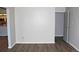 Bright living room with neutral walls and wood-look flooring for easy maintenance at 14152 E Linvale Pl # 311, Aurora, CO 80014