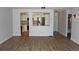 Open concept kitchen and living room with modern stainless steel appliances at 14152 E Linvale Pl # 311, Aurora, CO 80014