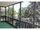 Enclosed patio with a view showcasing natural light and the neighborhood greenery at 14152 E Linvale Pl # 311, Aurora, CO 80014