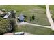 Aerial shot capturing the home, garage, and long driveway with lush greenery at 1062 Pinon Ln, Elizabeth, CO 80107