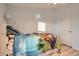 bedroom featuring Paw Patrol themed comforter, light blue walls and plank flooring at 1062 Pinon Ln, Elizabeth, CO 80107
