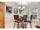 Cozy dining area with stylish wrought iron table set and lots of natural light at 1062 Pinon Ln, Elizabeth, CO 80107