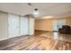 Spacious room features hardwood floors and a sitting area with a large comfy chair at 1062 Pinon Ln, Elizabeth, CO 80107
